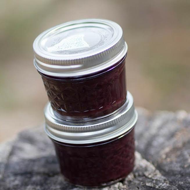 food in jars stacked on each other