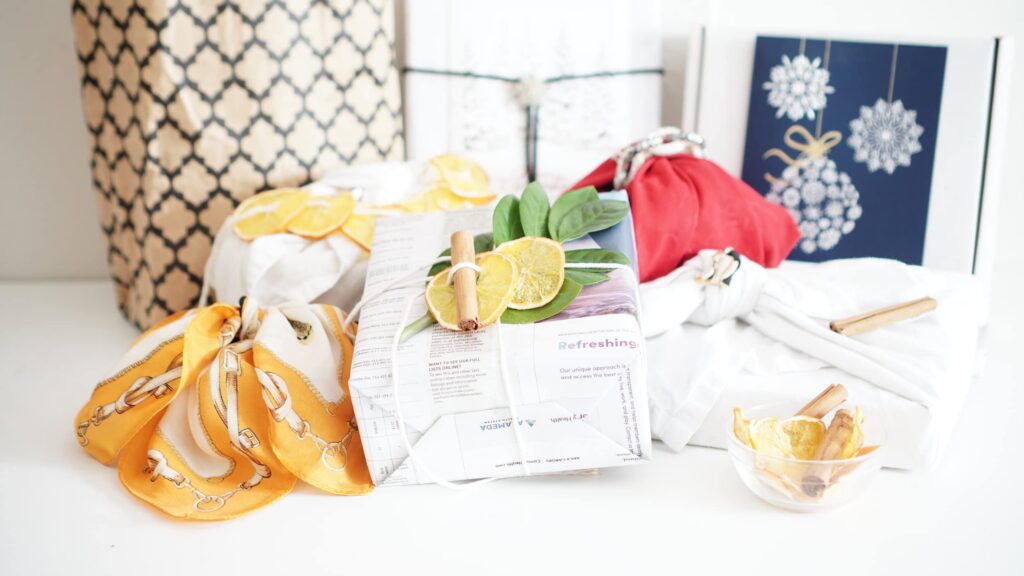 Zoomed out photo of sustainable gift wrapping ideas.