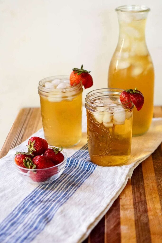 pitcher with glasses of loose leaf iced tea