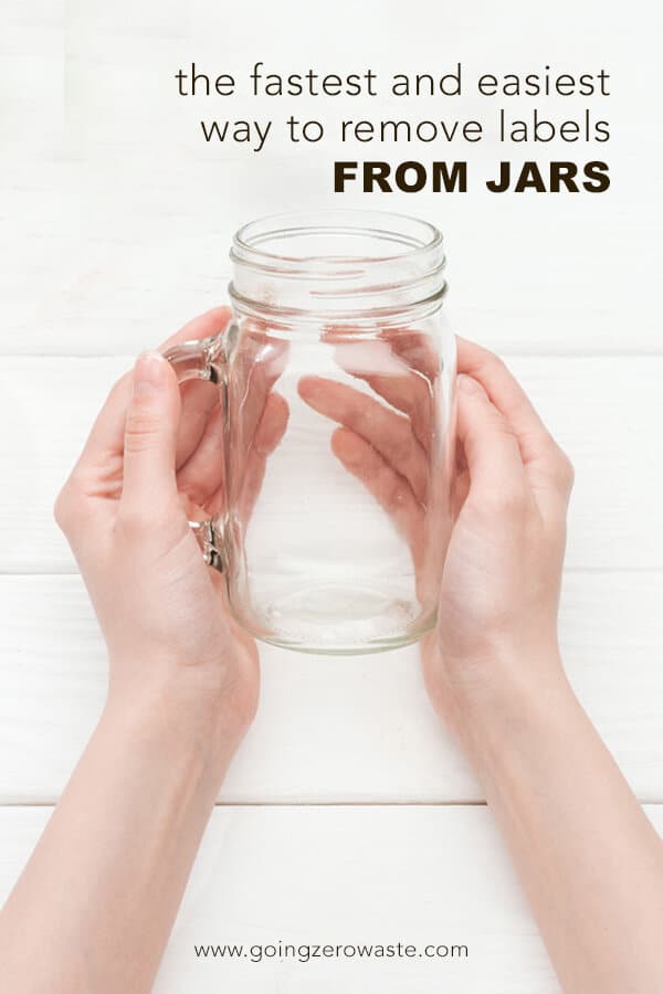 hands holding glass jar without stickers