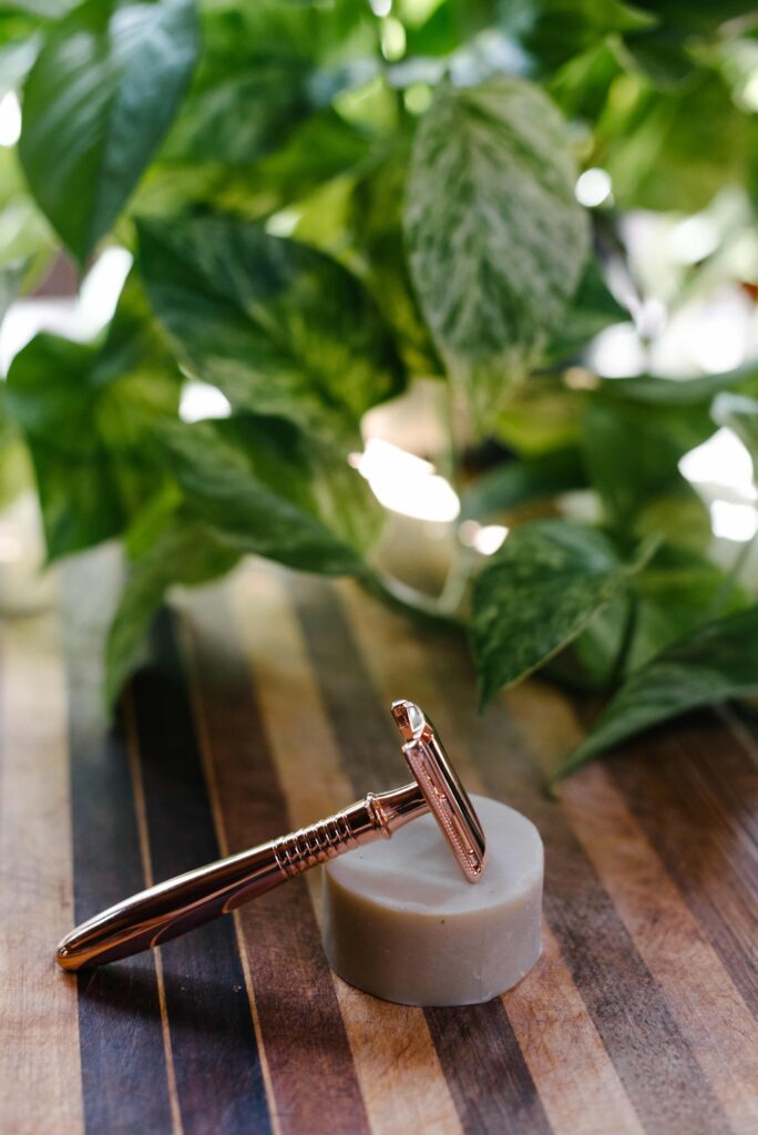image of a rose gold colored safety razor