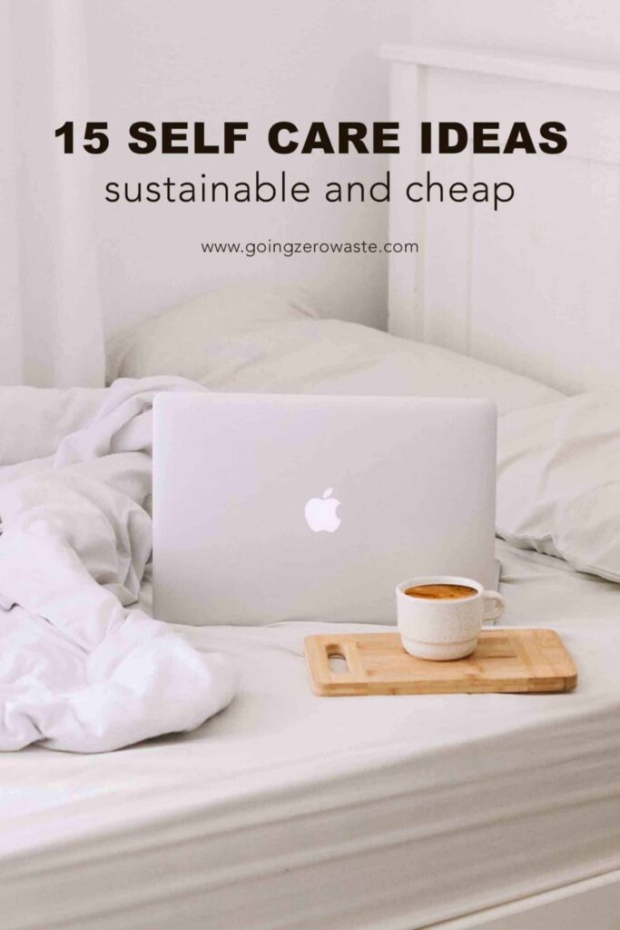 A photo of a Macbook and a cup of coffee on a bed with overlay text reading "15 self care ideas: sustainable and cheap"