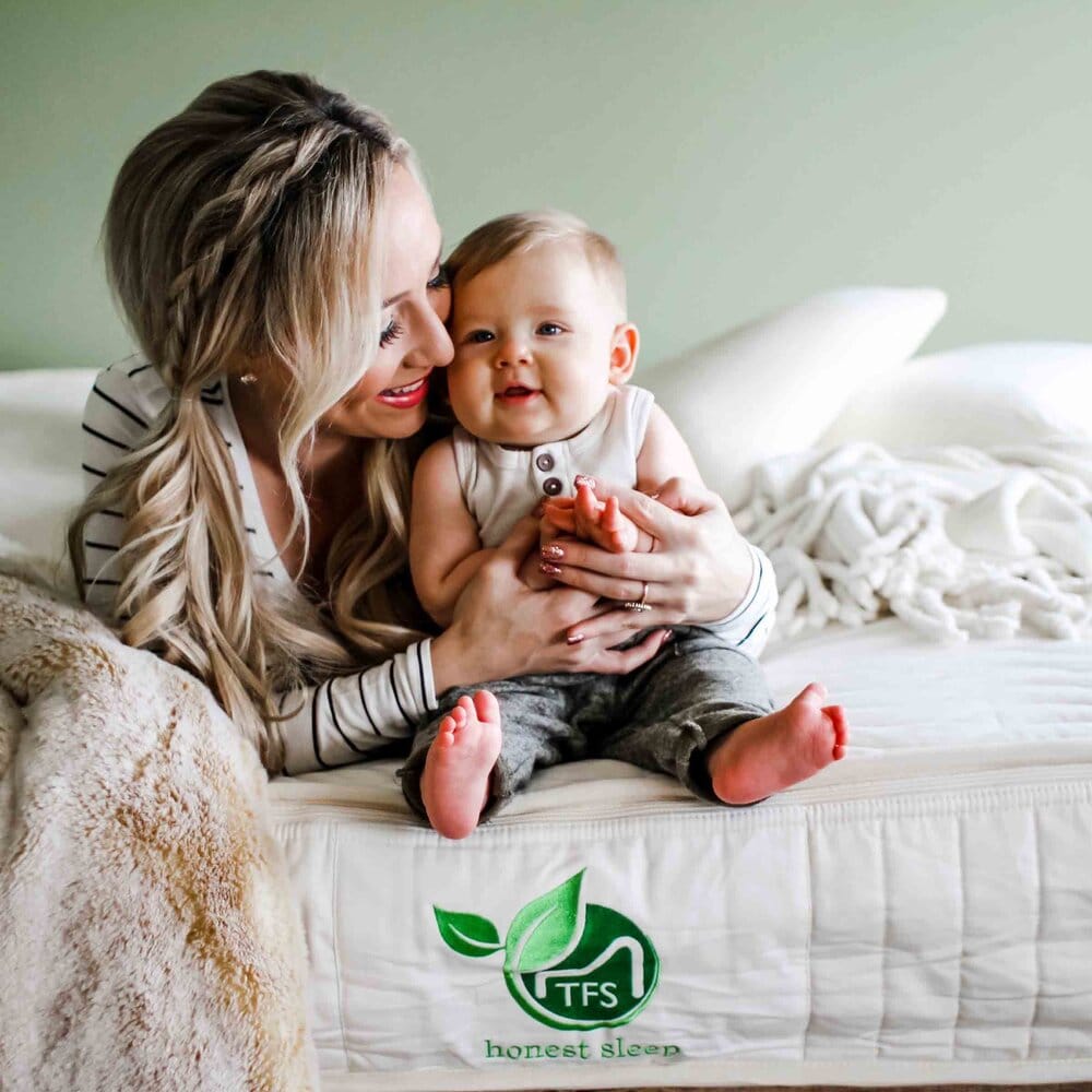 woman with baby on eco friendly mattress