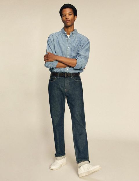 man wearing sustainable jeans