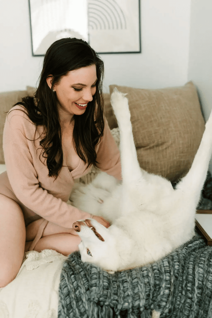 woman petting dog