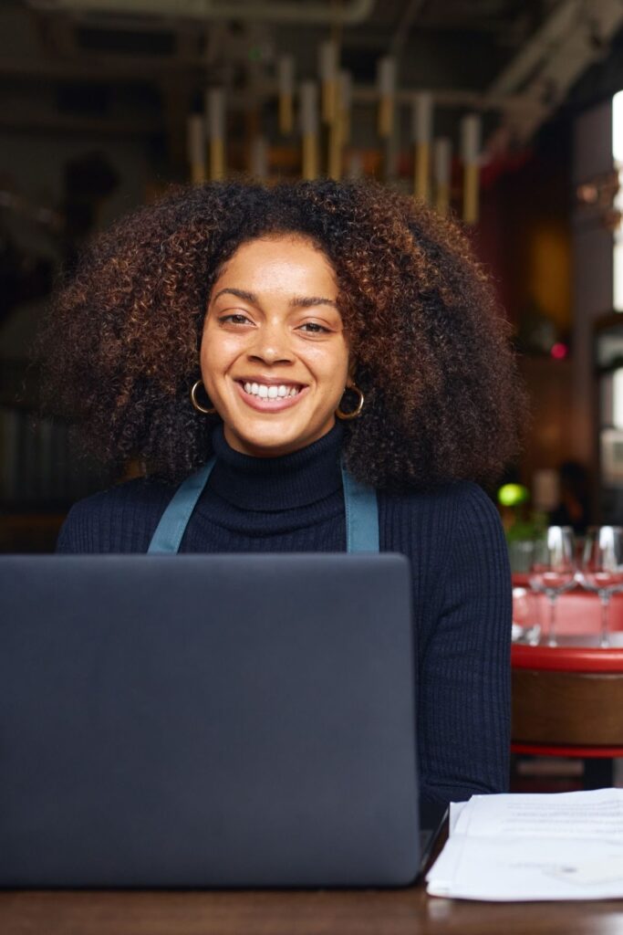 woman smiling while eco banking