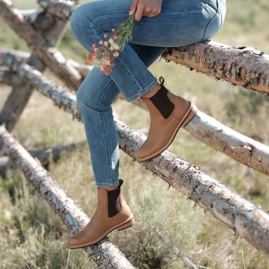 image of model wearing brown winter boots