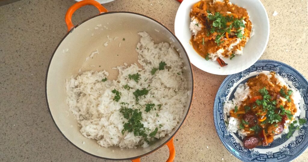 red pepper soup served over rice