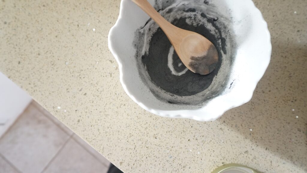 Ingredients for blackhead face mask are mixed in a bowl