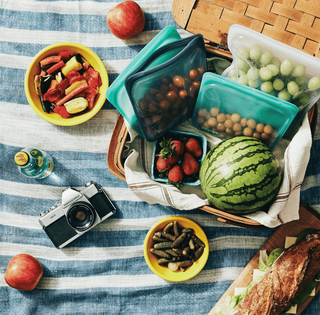 Top view of beach gear and a beach day picnic.