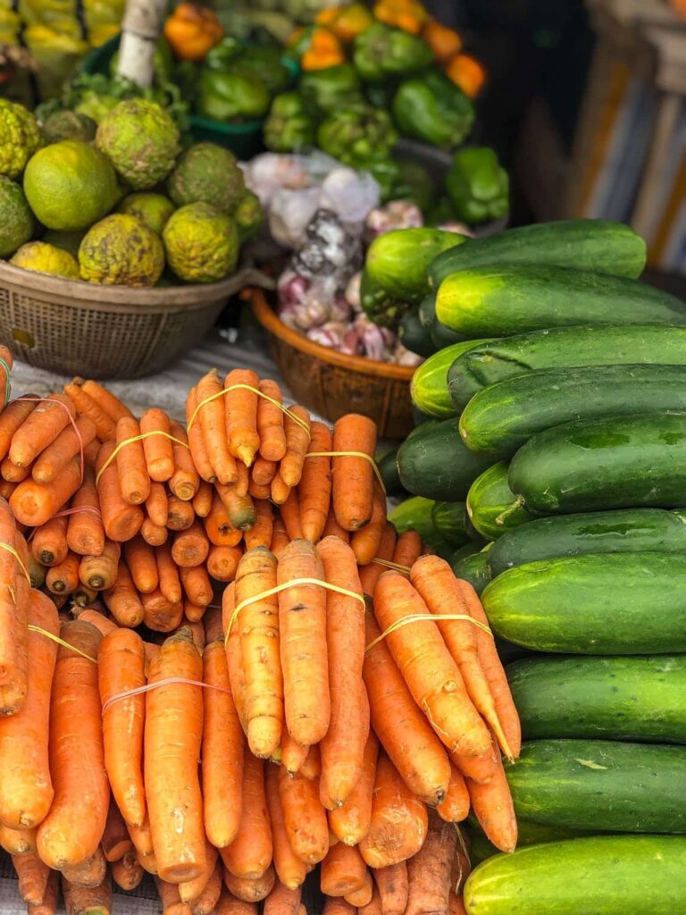 a table full of fresh produce, part of the farm to table movement