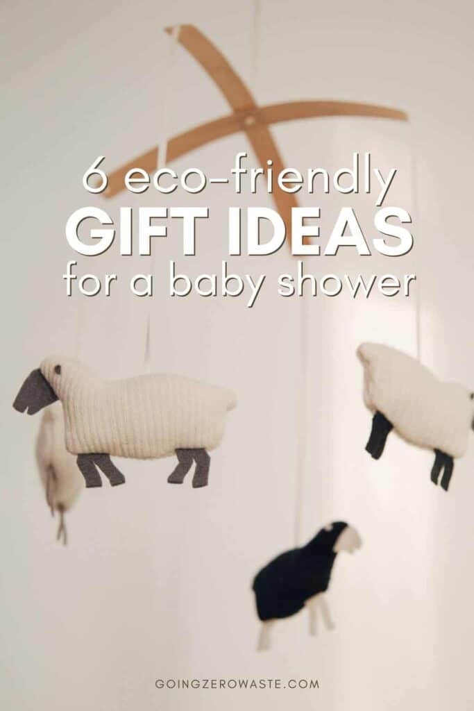 photo of baby toys with overlay text reading "6 eco friendly gift ideas for a baby shower" for a post about eco friendly baby gifts