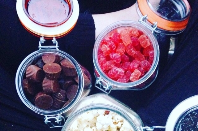 Top view of jars filled with bulk goods showing how to shop sustainably