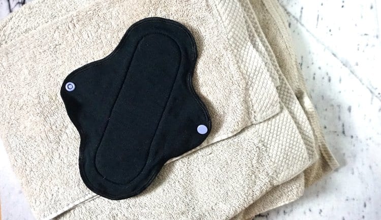 a reusable pad, one of the featured eco friendly period products