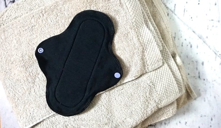 a reusable pad, one of the featured eco friendly period products 