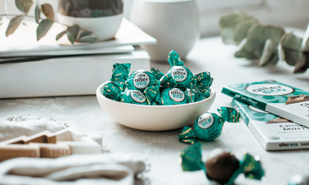 a bowl of Alter Eco candies wrapped in compostable wrappers.