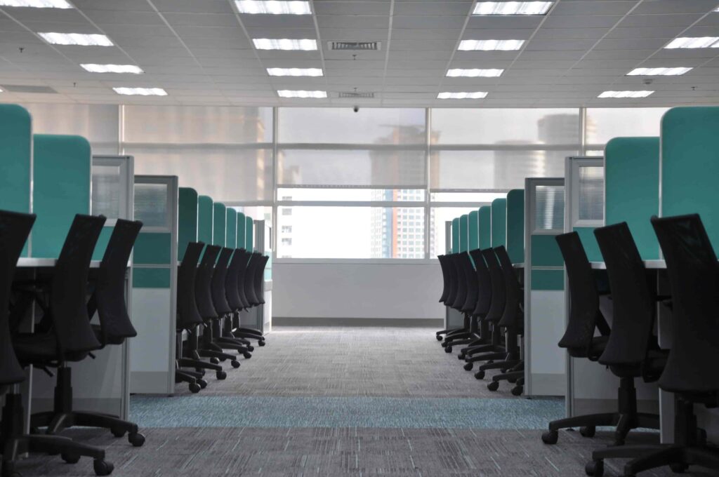 rows of cubicles in sustainable workplaces.