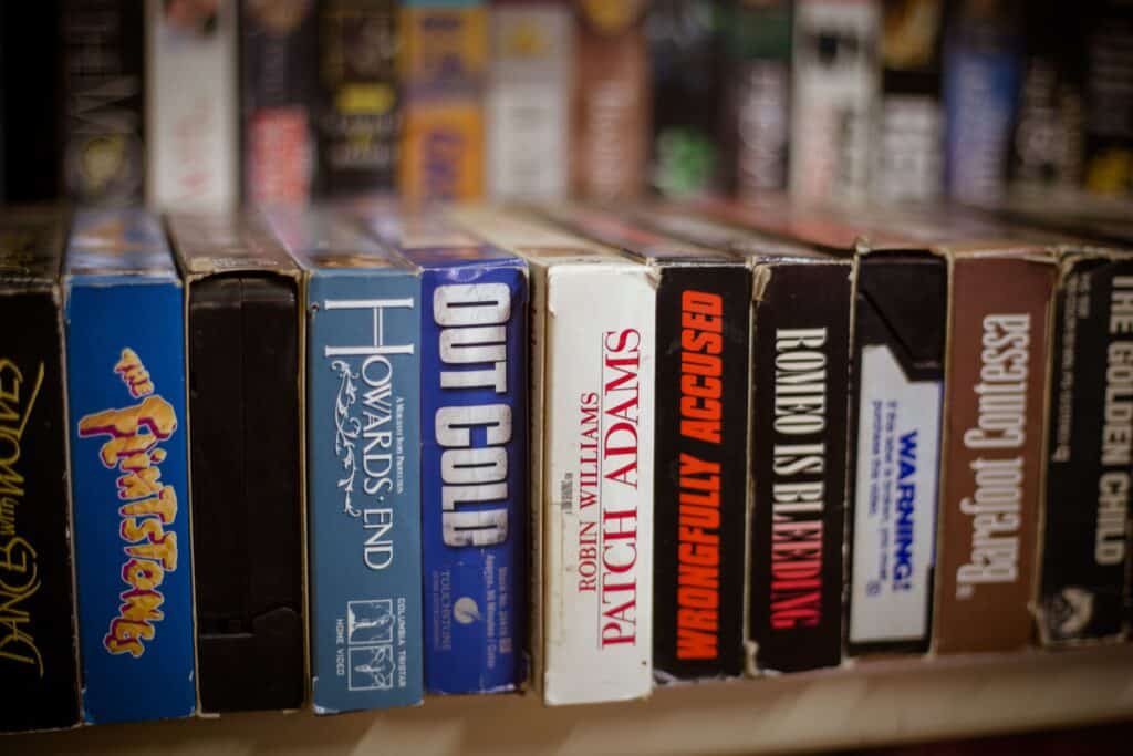 A row of VHS tapes in a post about how to recycle VHS tapes