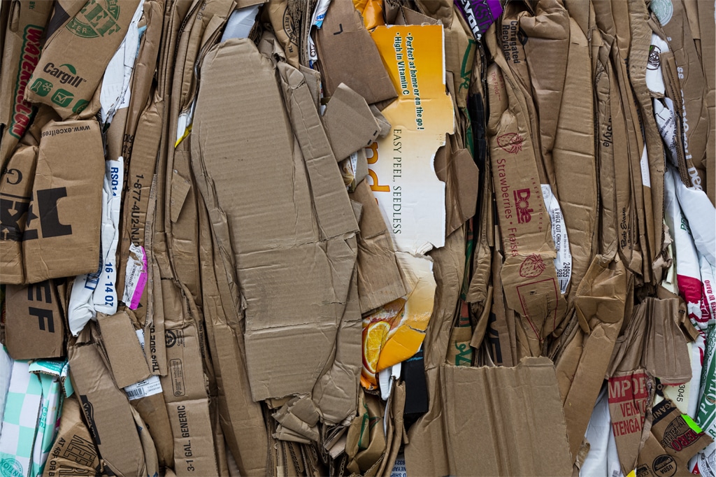 compressed cardboard and paper in a post about paper recycling. 