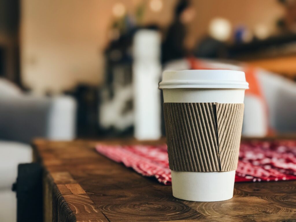A paper coffee cup to illustrate why recycling paper coffee cups is difficult