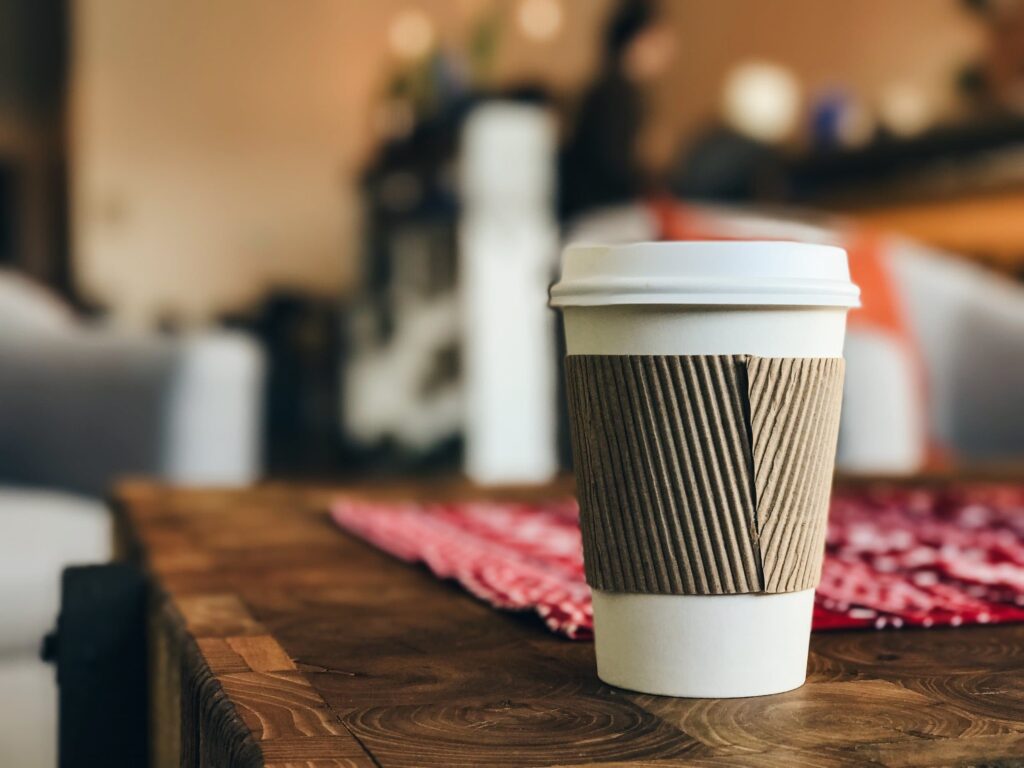 A paper coffee cup to illustrate why recycling paper coffee cups is difficult 