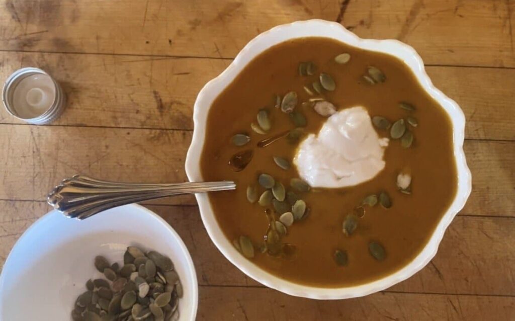 What I eat in a day as a vegan - top view of a bowl of curried carrot and ginger soup