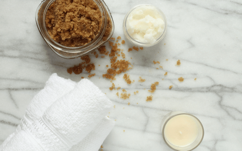 Top view of a sugar lip scrub DIY recipe stored in jars.