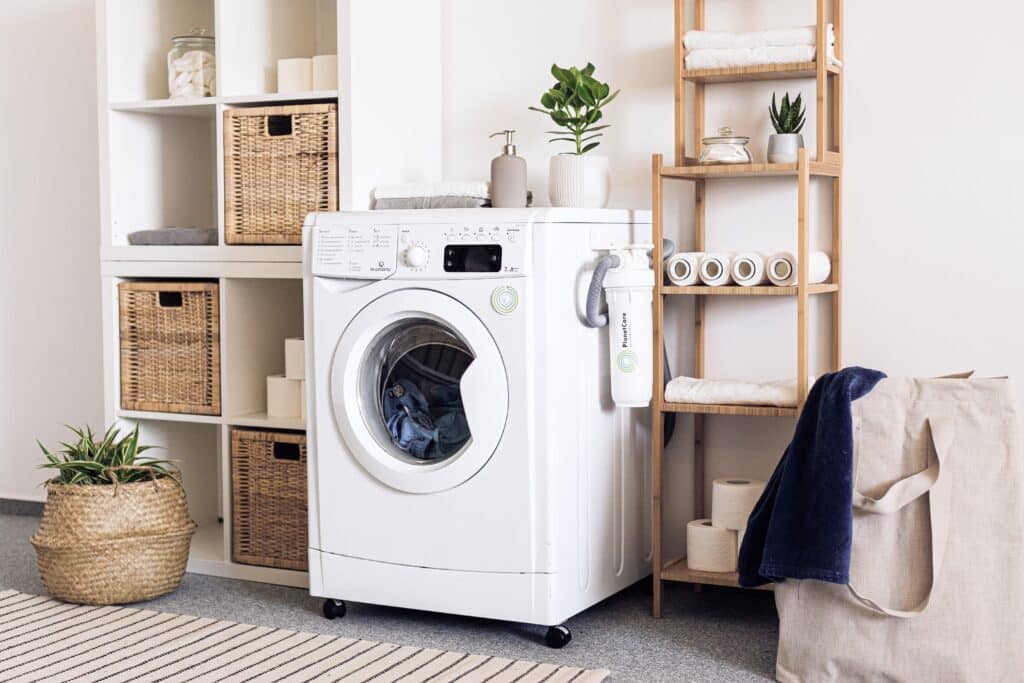 Energy efficient appliances - an Energy Star washer next to organizational racks.