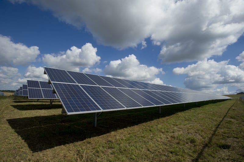 Is solar power worth it? Solar panel fields.