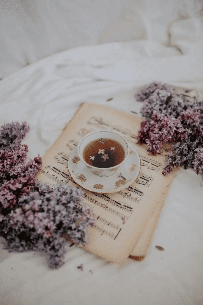 night routine ideas: a cup of tea on a sheet of music to unwind at night. 