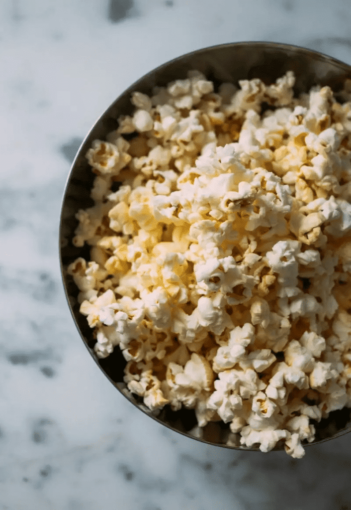 Top view of a bowl of popcorn to relax at night. 