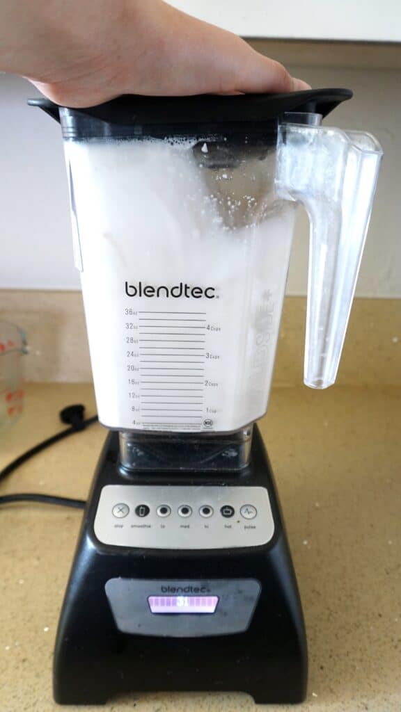 Almonds being blended before being put strained through nut bags for making milk.